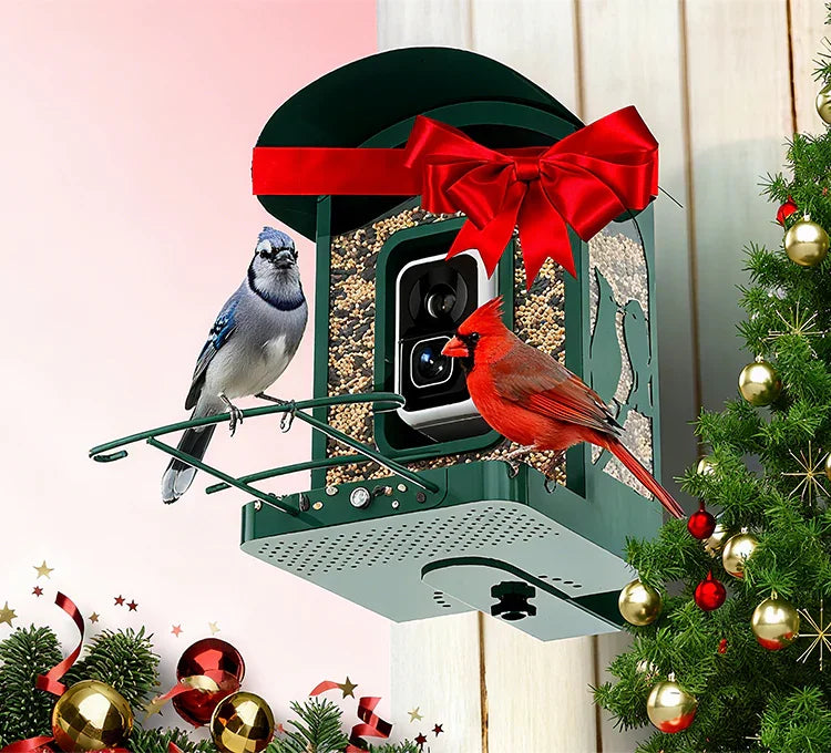 Bird feeder with a red bow, birds perched on it, Christmas tree with ornaments in the background